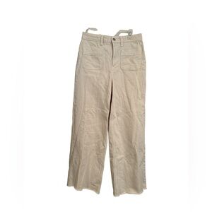 Free Assembly Cream Flare Jeans Size 4. Frayed hem